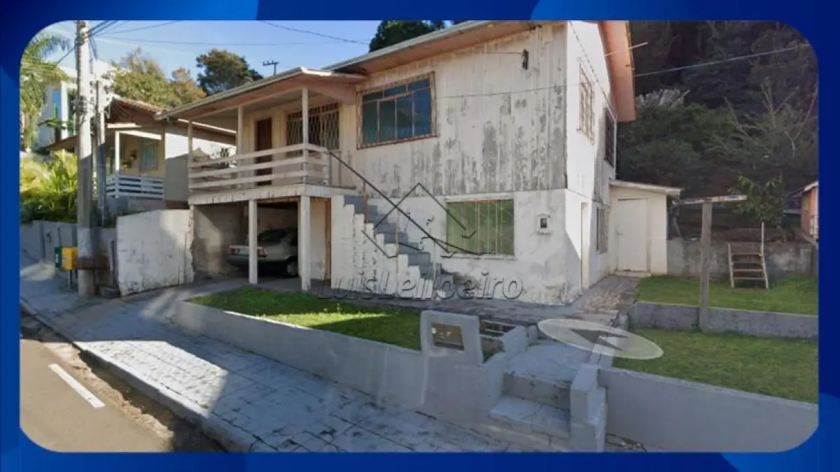 LOTE 003 - CASA - Cota parte do Lote urbano 33, Quadra 47, Rua João Caldart, nº 240, Centro, Capinzal/SC, Área de 405m² de terreno e 140m² de área construída
