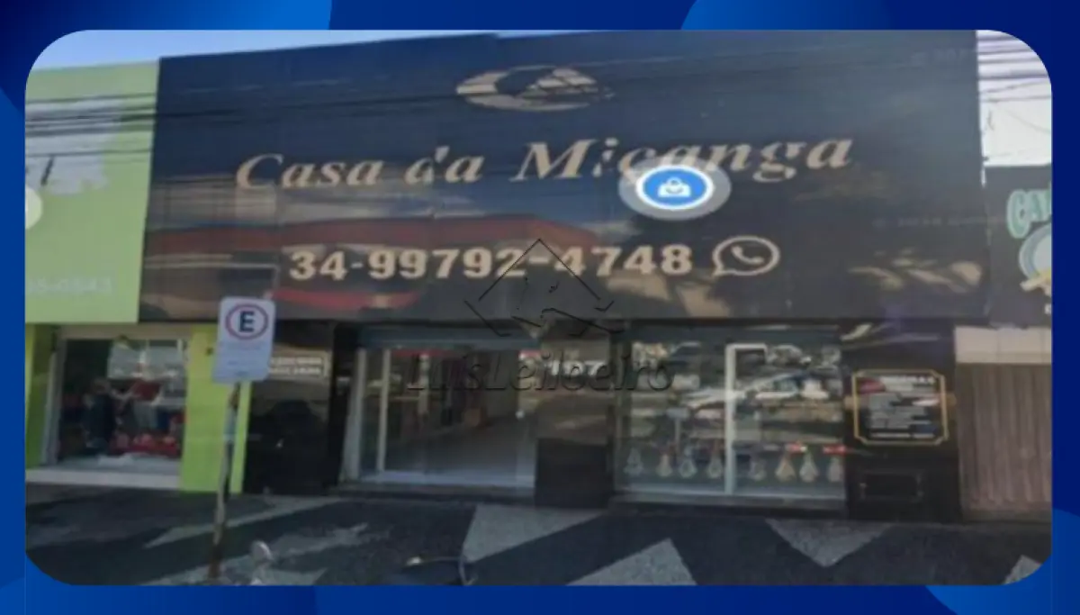 LOTE 026 - Imóvel Comercial - Quota parte do imóvel comercial situado na Avenida João Pessoa, nºs 197 e 203, esquina com Avenida João Pinheiro, Urbelândia/MG, com área total construída de 942,65 m². (PARCELAMENTO EM ATÉ 60 MESES)