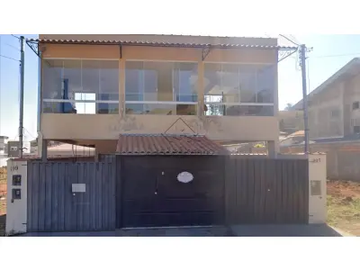 LOTE 020 - Imóvel Residencial localizado na Rua Padre Júlio Chevalier, n°199 e 207.