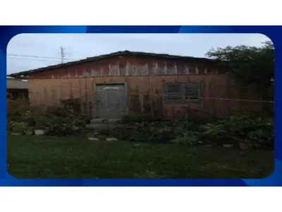 LOTE 000 - CASA - 25% do lote nº 07, Quadra nº 1, Loteamento Domingos Pignat, Rua Independência, nº 771, Caibi/SC, com casa de madeira edificada em parte do terreno