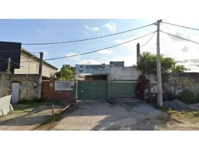 LOTE 00571 - IMÓVEL COMERCIAL E RESIDENCIAL - Imóvel comercial e residencial localizado na Rua Miguel Valfredo, 259, Recreio Ipitanga, município de Lauro de Freitas/BA, com área total do terreno de 1.030,00 m².