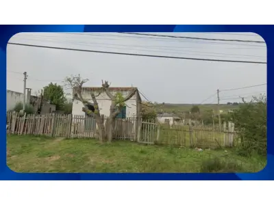 LOTE 062 - Lote - LOTE DE TERRENO 04 DA QUADRA 13, À RUA SERAFIM G. DOS SANTOS, NA VILA BELA VISTA, SANTANA DO LIVRAMENTO/RS. COM ÁREA DE 360M²